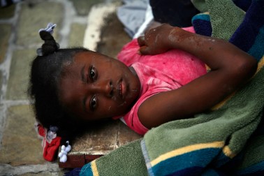 A small girl lying dead on her hospital bed because of lack of medical care.
